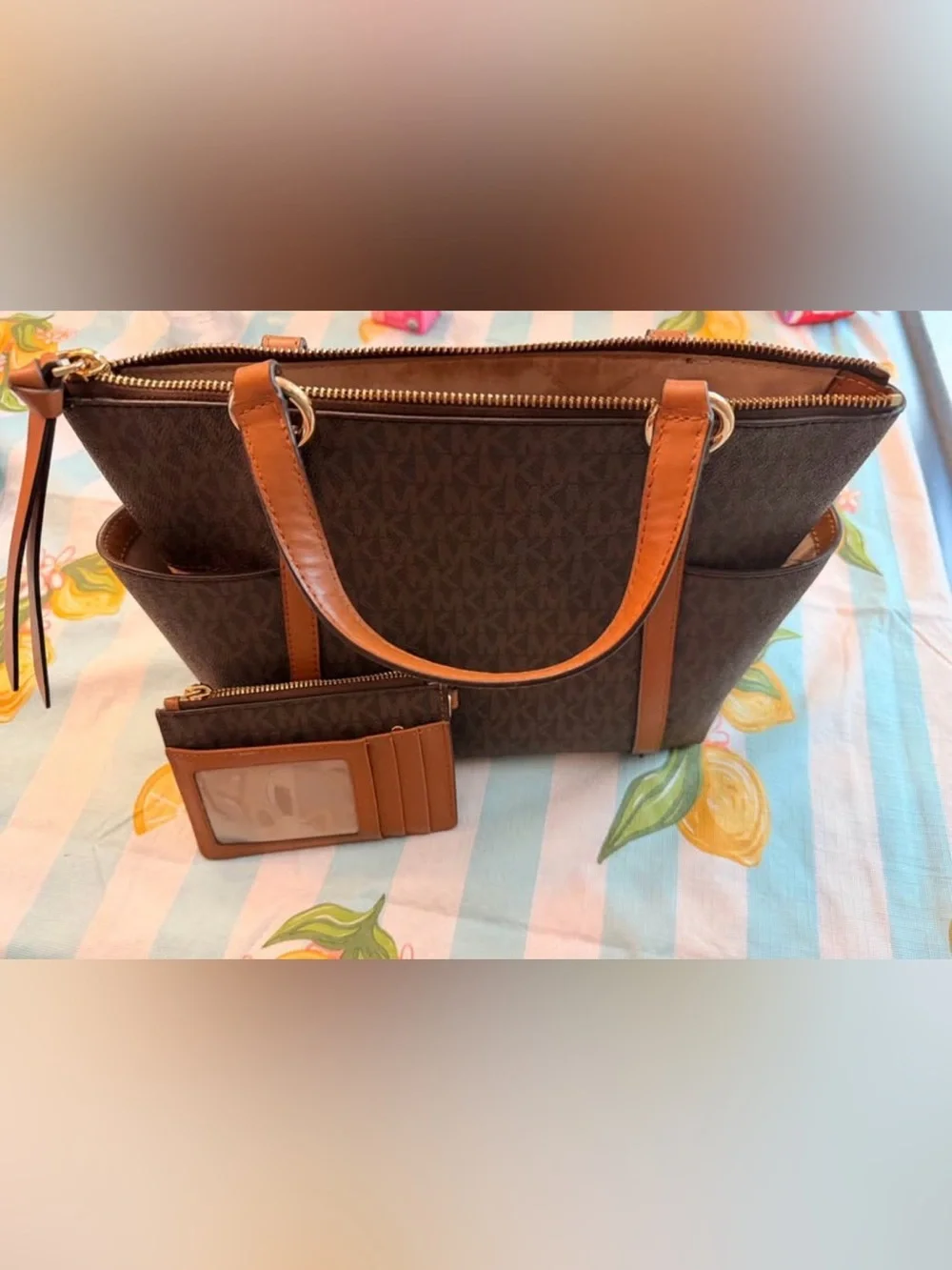 Michael Kors purse with matching wallet.